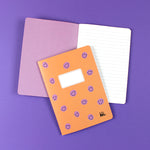 Notizheft apricot mit lila Smiles, liniert, DIN A5